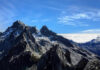 Vanished In Tahoe’s Granite Maze Snowy mountain peaks under clear blue sky.