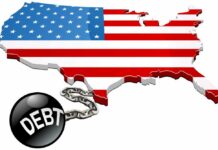 Debt Boom, Thin Savings — TICKING TIME BOMB Map of the USA with an American flag design and a ball and chain labeled 'DEBT'