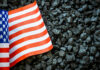 Trump’s $700M Coal Energy News Shocker US flag on pile of dark coal rocks