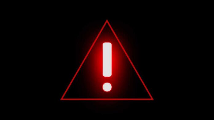 Red warning triangle with exclamation mark on black background