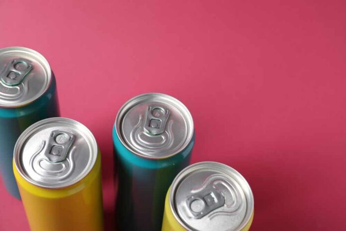 Many,Tin,Cans,On,Pink,Background,,Closeup.,Space,For,Text