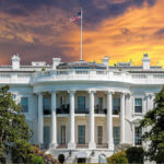 Deadly Trap Planned For White House? The White House with vibrant sunset sky.