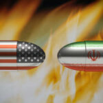 Bullets painted with U.S. and Iran flags face each other amid flames