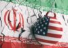 NEWS ALERT: Missile Standoff – Trump Dares Tehran A wrecking ball painted with the American flag is breaking through a wall featuring the Iranian flag