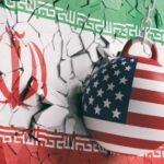 NEWS ALERT: Missile Standoff – Trump Dares Tehran A wrecking ball painted with the American flag is breaking through a wall featuring the Iranian flag