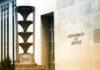 DOJ TORCHES $722M Crypto Case Exterior view of the Department of Justice building with architectural features