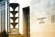 DOJ TORCHES $722M Crypto Case Exterior view of the Department of Justice building with architectural features