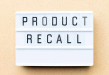 Shattering Grills Spark $500 Payouts Lightbox sign with the words product recall on a beige background