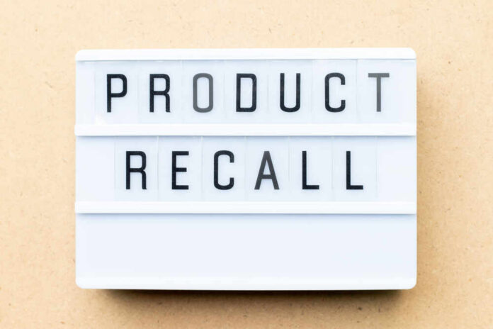 White,Lightbox,With,Word,Product,Recall,On,Wood,Background Lightbox sign with the words product recall on a beige background