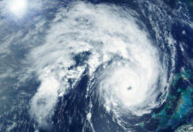 Forecast Chaos Sparks Gulf Panic Satellite image of a hurricane over the ocean.
