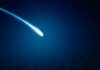 Baby Saturn Stuns Astronomers A bright comet streaking across a dark night sky filled with stars