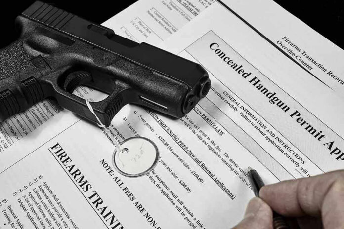 391851421 Handgun on concealed carry permit application forms.