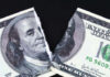 $1.8B Slush Fund Killed — Why Now? A torn hundred dollar bill featuring Benjamin Franklin