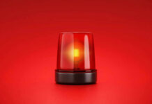 Deadly Shaft, Bodies Pile Up Red emergency light on red background