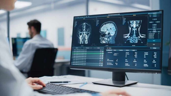 Doctor reviews brain MRI scans on a widescreen computer monitor