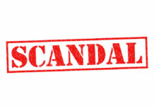 Red stamp with the word scandal
