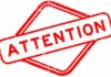Red attention sign with the word 'ATTENTION' in bold letters