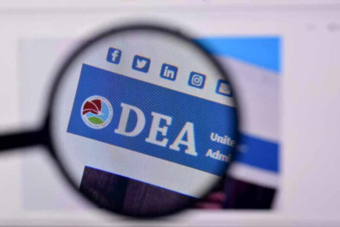 shutterstock_2306106313 Closeup of DEA website through a magnifying glass.