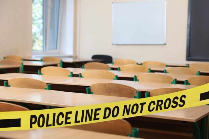 Empty classroom blocked by police tape