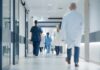 Hospital Mix-Up Paralyzes Patients Medical staff walking through a hospital corridor