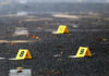 Fast-Food Bloodbath Stuns Idaho Yellow evidence markers labeled 8, 9, 10 on pavement.
