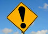 Security Chaos Triggers THIS School Switch? Yellow caution sign with exclamation mark symbol.