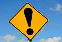 Security Chaos Triggers THIS School Switch? Yellow caution sign with exclamation mark symbol.