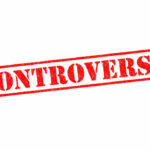 Small Cameras, Massive Dragnet Controversy stamp in bold red letters