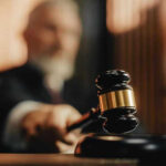 Judge Orders THIS Man Be Force-Fed Judge striking gavel in courtroom.