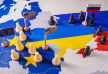 Russia Threatens U.S. Ally — What’s Next? A map of Europe with chess pieces and flags representing different countries