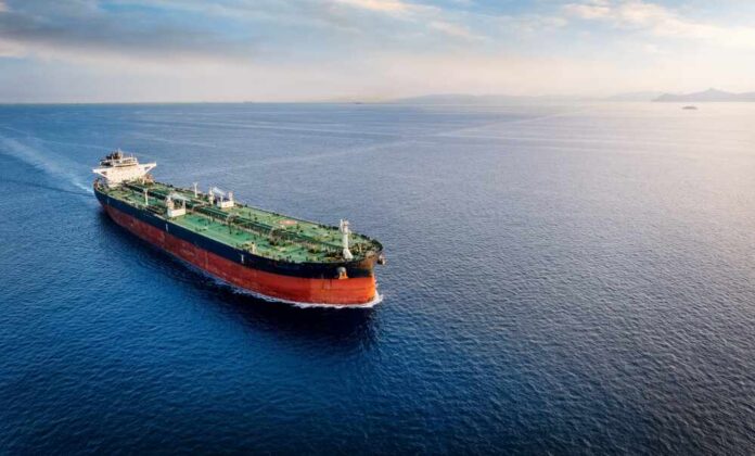An oil tanker navigating through calm ocean waters