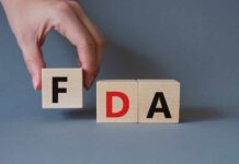 FDA Slams THESE Cheap Weight Loss Drugs? A hand holding a wooden block with the letter F, next to blocks spelling FDA