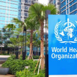 Ebola Surge Hidden — Doctors Sound Alarm World Health Organization sign outside modern building