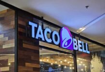 Taco Bell storefront sign with illuminated logo