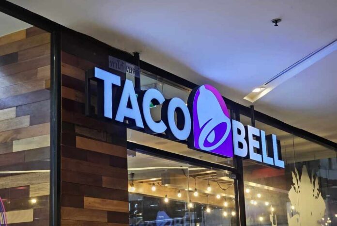 Bangkok,,Thailand,-,July,29,,2024:,Taco,Bell,Sign.,Taco Taco Bell storefront sign with illuminated logo