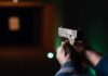 Eviction Warnings Ignored — Deadly Shooting Follows Hands aiming a pistol at an indoor shooting range