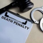 Pop Star Murder Case Explodes – Death Penalty?! Clipboard with death penalty document beside gavel and handcuffs