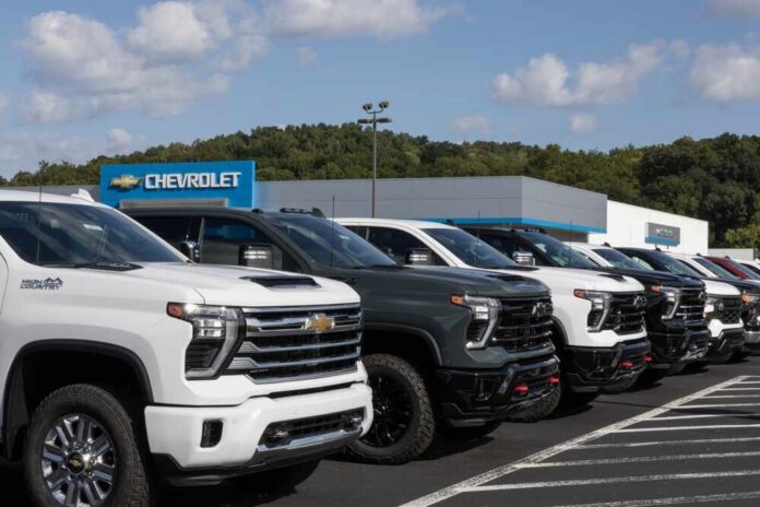 West,Harrison,-,September,7,,2025:,Chevrolet,Silverado,2500,Display Row of pickup trucks at a dealership lot