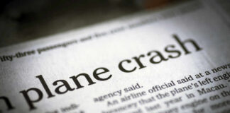Newspaper headline about a plane crash.