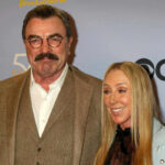 CBS MELTDOWN: 60 Minutes Purged Tom Selleck posing with a blonde woman at a red carpet event