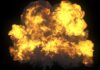 VIDEO: Starship Lifts, Then BOOM A large explosion with flames and smoke against a dark background