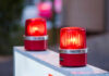 Tour Turns Deadly At Landmark red warning beacons on a barrier