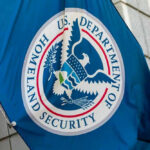 Threats Surge – 40% Spike U.S. Department of Homeland Security flag.