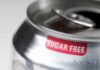 Close-up of a soda can with a 'sugar free' label