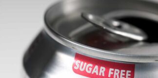 Close-up of a soda can with a 'sugar free' label