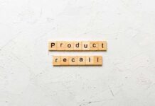 Walgreens Eye Drops Pulled Over Sterility Scare Wooden letter tiles forming words on a white textured surface