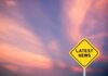 Public Death Plan Sparks Global Blowback Yellow diamond sign reading latest news against a colorful sunset sky